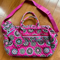 Vera Bradley Weekender Bag, In Retired “Pink Cupcake” Sold As A Set With A Matching Curling & Flat Iron Cover. Both In Excellent Condition. Iron Cover Was Never Used. Weekender Bag Has Two Large Pouches On One Exterior Side And A Zippered Pouch On The Opposite Exterior Side. The Interior Has Four Pouches. The Bag Includes A Detachable, Adjustable Matching Pink Shoulder Strap As Well As Sturdy Handles. Iron Cover: 4.25” X 12.25”. Weekender Bag: 18.5” X 9” Base. 12” High. Pink Rectangular Diaper Bag For On-the-go, Pink Diaper Bag With Removable Pouch For On-the-go, Pink Large Capacity Diaper Bag, Pink Shoulder Bag Diaper Bag For Travel, Pink Double Handle Diaper Bag, Pink Large Capacity Diaper Bag For On-the-go, Pink Diaper Bag With Double Handle, Pink Rectangular Travel Bag With Removable Pouch, Pink Rectangular Travel Diaper Bag