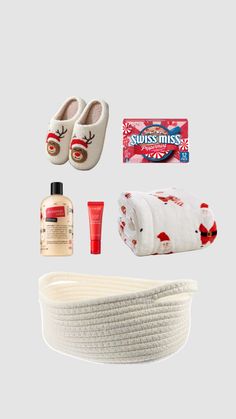 the contents of a baby's christmas gift set including shoes, diaper and soap