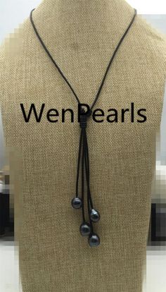 "It's real tahitian pearl, not freshwater pearl, natural color,no dye pearl luster: high luster pearl body: have ring pearl shape: Drop pearl size: around 8-11mm pearl color: tahitian black color Back to Other Jewelry Section 01: \"Tahitian,Akoya,Sea Pearl\" Section: https://www.etsy.com/shop/WenPearls?section_id=15806339 02: \"Potato/Near Round Pearl\" Section: https://www.etsy.com/shop/WenPearls?section_id=16378067 03: \"Round Pearl\" Section: https://www.etsy.com/shop/WenPearls?section_id=161 Leather Pearl Jewelry, Leather Pearl Necklace, Black Pearl Necklace, Big Pearl, Pearl Leather, Sea Pearl, Keshi Pearls, Sea Pearls, Tahitian Pearls