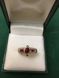 This is a gorgeous 14k solid yellow gold and fantastic red natural ruby and diamond ring . It has a gorgeous vintage retro look . The Ruby is gorgeous red and is approximately 4mm x 5mm . It is pre-owned but in nice condition . This ring is size 6.5 and weights 2.4 grams .please ask any questions you might have . Thank you for watching . Ruby And Diamond Ring, Natural Ruby, Retro Look, Solid Yellow, Diamond Ring, Jewelry Watches, Retro Vintage, Ruby, Jewelry Rings