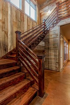 an image of a wooden staircase in a house that is being advertised for $ 1 million