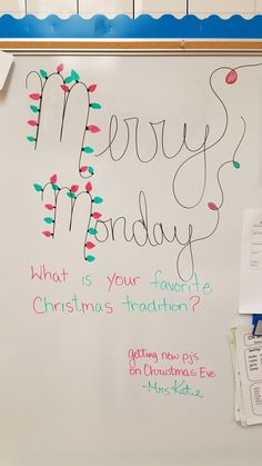 a white board with writing on it that says merry monday what is your favorite christmas tradition?