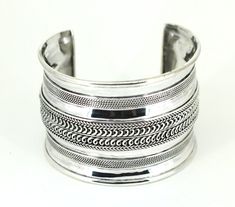 Vintage Wide Textural Handmade Solid Cuff Bracelet 925 Sterling Silver BR 3674 Condition: Excellent  Metal:  925 Sterling Silver Weight: 67 grams Bracelet Size: 7.5 in  Width : 49.31 mm Images you see are actual pictures of jewelry you will receive Every purchase comes thoughtfully packaged and ships within 1 business day New York State buyer will be charged sales tax Feel free to contact us with any questions. We are open Mon-Fri 9-5 EST We appreciate your business Eternity Band Engagement Ring, Scroll Design, Sales Tax, New York State, Bracelet Sizes, Beautiful Bracelet, New Day, Cuff Bracelet, Sterling Silver Earrings