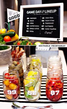 several jars filled with different fruits and vegetables on top of a table next to a menu