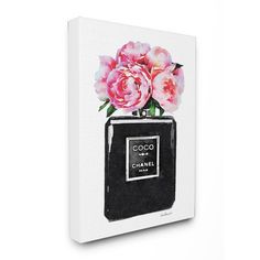 a black and white photo with pink flowers on it's cover is mounted to the wall