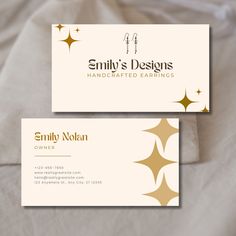 two white business cards with gold stars on the front and back, one for simply designs handcrafted earings