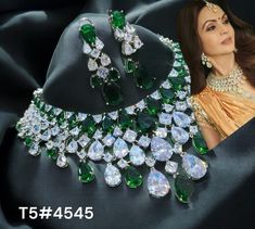 Premium Nita Ambani Inspired Silver Zirconium Diamond Necklace Choker Set/ Wedding Cz Stylish Jewelry  Make an entrance in this stunning emerald green  diamond  necklace and earrings set featuring lab simulated emeralds and AAA Quality white Cz that sparkle like diamonds. Platinum plated. The Necklace Has adjustable Chain The Earrings Have Pushbacks Earrings measure 3 inches Approx. Highest quality and craftsmanship. Please let me know if you have any questions Customized orders takes 3 to 4 wee Dazzling Green Emerald Necklace For Anniversary, Dazzling Emerald Necklace For Wedding, Dazzling Round Emerald Necklace For Wedding, Brilliant Cut Emerald Necklace For Wedding, Wedding Emerald Necklace With Diamond Accents, Traditional Cubic Zirconia Emerald Necklace For Wedding, Formal Green Bridal Necklace With Sparkling Stones, Green Crystal Emerald Necklace For Wedding, Green Crystal Necklace For Wedding