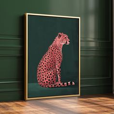 a cheetah sitting on the floor in front of a green wall with wood floors