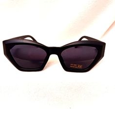 Artsy Cat Sunglasses Black Angular Modern Unisex Dark Lens Uv Protect Unisex New! These Gorgeous Geo Cat Eyes Sunglasses Feature Fun Glam Style! Features: Black Frames Pointed Shaped Lens Uv Protection Black Dark Lenses One Size Fits Most Brand New Item See Photos Of The Actual Sunglasses For More Detail. Stunning Ready To Ship Immediately Top Seller, Fast Shipper! Rating! Inventory Bxc#908 Black Plastic Cat Eye Sunglasses For The Beach, Black Plastic Cat Eye Sunglasses For Beach, Black Plastic Cat Eye Sunglasses Casual Style, Casual Black Cat Eye Sunglasses For Party, Cat Sunglasses, Black Frames, Glam Style, Cat Eyes, Glam Fashion