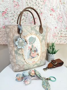 a handbag sitting on top of a white table