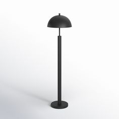 a black floor lamp on a white background