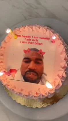 a birthday cake with an image of a man on it