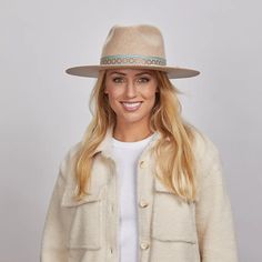 Maldives Moon | Womens Wide Brim Felt Fedora Hat blends elegance with a hint of adventure. Made from firm Australian felt wool, this safari-style hat features a cotton web band with twine overlay, adding unique texture and style—perfect for women seeking a bold, refined look. Material: Mid-weight Firm Australian Felt Wool Shape: Safari Trim: Mexican Geometric-tribal Print Ribbon Band and Twine String Overlay Brim Size: 3 1/2" Crown Height: 4" Sweatband: AHM Velcro Imported Wide Brim Felt Hat, Brown Cowboy Hat, Hats For Big Heads, American Hat Makers, Black Cowboy Hat, Patriotic Hats, Black Cowgirl, Pork Pie Hat, Felt Cowboy Hats