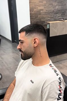 50 Best Fade Haircuts for Men (Detailed Gallery) | Heartafact Mid Fade Haircut Men With Beard, Mid Skin Fade Men, Haircut For Men With Beard, Mid Cut Hair, Cortes De Cabello Corto Hombre, Buzz Cut Mens, Buzzcut Men Fade, Buz Cut, Skin Fade Haircut