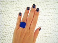 1 square statement ring with lapis lazuli blue (cobalt, royal blue) opaque resin. A monochrome and minimal ring, in a bold and unique color, that can match your clothes, your style, your daily mood! A beautiful ring, in a deep and dramatic blue color, the color of inspiration and spirituality... The ring is square with round corners, 18 X 18 mm, adjustable. It is made of palladium, a wonderful, hypoallergenic, affordable alternative to sterling silver, that never fade, rust or tarnish. This ring is also available in a bigger square 25 mm X 25 mm setting: https://www.etsy.com/listing/227657267/lapis-blue-big-square-ring-made-of-resin Real colors may slightly differ from their appearance on your display, as it depends on the monitor settings. Blue Statement Ring, Lapis Lazuli Blue, Minimal Ring, Blue Ring, Lapis Blue, Square Ring, Greek Jewelry, Resin Ring, Square Rings