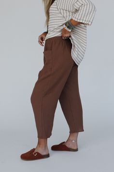 Effortless and cozy these wide leg pants are perfect for every occasion, the Travel Soul Drawstring Pants will have you leaning for more looks to style it with! Lightweight and comfortable solid Cotton gauze fabric Relaxed and loose wide leg pant silhouette High-rise, so cute contrast drawstring waistband Convenient front patch pockets Pair with: High Neck Racerback Brami, Wrapped Up In Color Knit Cardigan and San Antonio Bracelet Set. *Due to lighting and differences in monitors, actual colors Boho Essentials, Bralette Outfit, Cotton Gauze Fabric, Moon Collection, Comfy Pants, Gauze Fabric, Wide Leg Pant, New Tops, Drawstring Pants