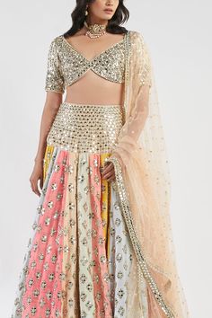 Multi-color drop-waist panelled lehenga with all-over mirror, sequin and zari work. Comes with embellished blouse and dupatta.
Component: 3
Embroidered
Neckline: V Neck
Sleeve Length: Half
Fabric:  Blouse &Lehenga: Raw silk; Dupatta: Net
Color: Multi Color
Drop waist
Panelled lehenga
Tassel tie-up back - Aza Fashions Navratri Multicolor Pre-draped Saree With Gota Work, Floor-length Embellished Multicolor Sharara, Floor-length Multicolor Embellished Sharara, Multicolor Embellished Floor-length Sharara, Multicolor Choli With Pallu For Party, Multicolor Embellished Saree Set, Embellished Multicolor Saree Set, Multicolor Party Choli With Pallu, Party Multicolor Choli With Pallu