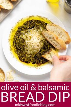 bread and olive oil in a bowl with bread on the side, along with text overlay reading olive oil & balsamic bread dip