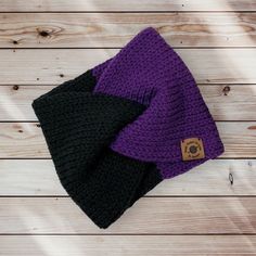 Women's Purple and Black Twisted Ear Warmer Headband. Warm and stylish! This ear warmer is made with 100% Soft Acrylic yarn. The colors are gorgeous together. You'll be sure to stay warm and look great wearing this classic ear warmer! Care: Machine wash and dry.  Refunds and Exchanges I gladly accept returns or exchanges. I want you to be happy with your purchase, so please contact me within 7 days after delivery if there is an issue with your item and I will work with you to return or exchange. Winter Headwrap Headband In One Size, Adjustable Black Winter Headwrap, Winter Headwrap Headband One Size, Winter Headband Headwrap, Adjustable Beanie Turban For Winter, Messy Bun Beanie, Crochet Twist, Crochet Winter Hats, Winter Headbands