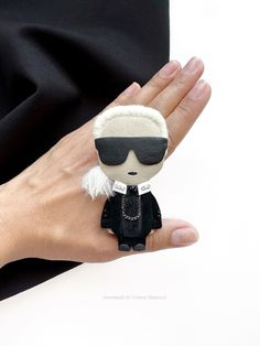 Karl Lagerfeld - a small black fashion designer brooch handmade from environmentally friendly materials: black Italian leather and fur .  Brooch size 3.5 inches, weight 12 grams. The brooch is fastened on a jacket, sweater, dress, cardigan, fabric bag. This women fashion brooch is the perfect stylish gift for lovers of handmade things. Care instructions: do not wash  Dry clean only  Karl Lagerfeld Lagerfeld brooch Lagerfeld vintage black brooch men black fashion fashion designer vintage brooch g Luxury Black Brooches For Formal Occasions, Luxury Black Brooch For Evening, Black Formal Brooch Lapel Pin, Chic Black Brooches For Parties, Black Formal Lapel Brooch, Chic Black Party Brooches, Vintage Black Lapel Pin For Gift, Vintage Black Lapel Pin As Gift, Black Vintage Lapel Pin For Gift