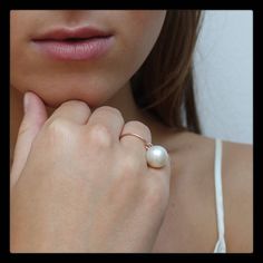 Available in 14K rose, white or yellow gold. The pearl measures 11-12mm. Classic Rose Gold Pearl Open Ring, Classic Rose Gold Open Pearl Ring, Formal Rose Gold Pearl Ring, Rose Gold Open Pearl Ring For Formal Occasions, Rose Gold Open Pearl Ring For Formal Events, Elegant Rose Gold Open Pearl Ring, Rose Gold Pearl Ring Fine Jewelry, Classic Rose Gold Pearl Rings, Minimalist Rose Gold Pearl Ring For Formal Occasions