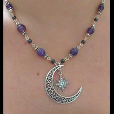 Made with Genuine faceted 8mm Amethyst and 4mm Hematite gemstones. Center focal filigree silver plated Crescent Moon with radiant starburst crystal charm. Fine silver plated findings and wire, Crescent Moon pendant focal measures approximately. 2 in. Necklace length 18in with 2in extender chain. Lobster Claw clasp. Matching earrings also available soon! Comes Gift boxed. *Custom Orders Welcome* Silver Crystal Necklace With Spacer Beads As Gift, Mystical Silver Amethyst Crystal Necklace, Silver Celestial Crystal Necklaces For Jewelry Making, Celestial Silver Crystal Necklaces For Jewelry Making, Handmade Silver Celestial Crystal Necklace, Celestial Silver Wire Wrapped Necklace, Handmade Celestial Silver Crystal Necklace, Celestial Silver Gemstone Crystal Necklaces, Spiritual Silver Crystal Necklace With Gemstone Beads