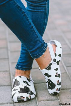 Olivia Mark - Classic Clogs with White Cow Spots Print Trendy Non-slip Clogs With Round Toe, Spring Non-slip Flat Heel Clogs, Trendy Non-slip Closed Toe Clogs, Casual White Mules With Round Toe, Casual White Round Toe Mules, Trendy Non-slip Round Toe Clogs, Casual White Synthetic Mules, White Closed Toe Casual Mules, Casual White Flat Heel Mules