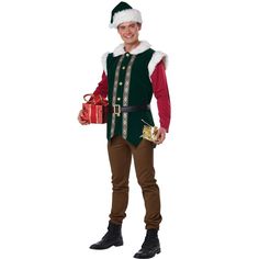 a man in a green and red christmas outfit holding a present box while wearing a santa claus hat