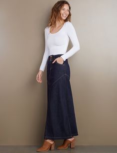 Details of old, made new. Beautiful waist/button detail, with pieced Premium denim construction, the Pieced Denim Maxi Skirt from Wash Lab is a must-own classic. The cover model is 5'9" wearing a size 26 Fabric: 95% Cotton 4% Polyester 1% Spandex Length: 39.25" from waist Casual Fitted Denim Skirt In Recycled Material, Casual Fitted Denim Skirt In Recycled Denim, Fitted Casual Denim Skirt From Recycled Material, Casual Fitted Recycled Denim Skirt, Casual Dark Wash Recycled Denim Skirt, Fitted Medium Wash Recycled Denim Skirt, Fitted Dark Wash Denim Skirt In Recycled Material, Fitted Dark Wash Denim Skirt From Recycled Materials, Fitted Dark Wash Recycled Denim Skirt