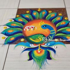 a colorful peacock painted on the floor