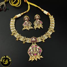 Our special Handcrafted fusion necklace is curated on brass ,hand painted and meena work on real stones pendant. This is a absolutely gorgeous and trending Piece.Metal: Brass with 92.5 SilverPolish: Gold Nickel FreePerfect for all occasion(Party, Wedding ,Engagement)Note: This product is handcrafted and vintage, it has slight irregularities in design which only add to its beauty. Due to the differences in displays of computers/laptops/phones or may be photographic lighting sources the color of t Kundan Chandbali Necklaces As Gift, Kundan Chandbali Necklaces For Gift, Festival Kundan Necklace, Hand Set, Ideal For Gifts, Hand Set Kundan Necklace As Festival Gift, Kundan Necklace Hand Set For Festivals And Gifts, Kundan Necklaces For Diwali Gift, Hand Set Chandbali Kundan Necklace As Gift, Meenakari Pendant Jewelry For Puja, Festive Kundan Necklaces As Gifts