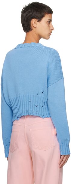 Knit cotton sweater. Distressing throughout. · Rib knit crewneck, cropped hem, and cuffs · Hand-stitched logo at collar · Dropped shoulders Supplier color: Iris blue Blue Cropped Sweater With Ribbed Cuffs For Fall, Blue Cotton Cropped Sweater, Blue Knit Cropped Sweater With Crew Neck, Blue Cotton Cropped Sweater For Winter, Blue Cropped Sweater Crew Neck For Spring, Blue Cropped Crew Neck Sweater For Spring, Cotton Cardigan, Knit Crewneck, Knit Cotton