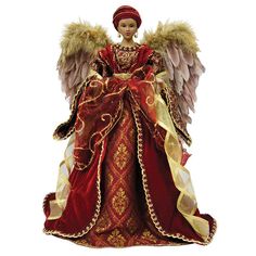 an angel figurine is dressed in red and gold