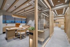 an office with wood and glass partitions