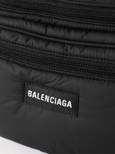 Balenciaga's 'Explorer' belt bag is as practical as it is cool. Made from nylon and quilted for a puffed-up shape, it's fitted with two zipped pouches to organise your belongings and has an adjustable fastening. Wear it around your waist or slung over one shoulder. On-the-go Nylon Duffle Bag With Removable Pouch, Sporty Nylon Belt Bag For On-the-go, Balenciaga Crossbody Bag, Black Nylon Belt Bag For On-the-go, Nylon Belt Bag With Zipper Closure For On-the-go, Balenciaga Bag, Black Nylons, Blue Bags, Belt Bag