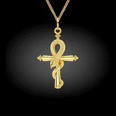 "P E N D A N T * D E T A I L S * Made in USA * Metal/purity: 14K or 18K solid gold * Finish: polished * Height: 1.5\" (38 mm) * Width: 1\" (26,7 mm) * Pendant weight (approx.): 5.5-6 grams in 14K * Bail: 8 mm (fits up to 4 mm chains) * Gender: unisex * This pendant is solid, not hollow in the back * Ships from California C H A I N * O P T I O N * Chain style & thickness: 1.5mm Cuban chain * Length available: 16\", 18\", 20\" * Chain weight (approx.): 2.8 - 3.5 g (varies between sizes) P R O Gold Ankh Necklace For Ceremonial Occasions, Gold Cross Necklace For Ceremonial Occasion, Ceremonial Ankh Amulet Necklace, Luxury Gold Ankh Jewelry, Spiritual Ankh Necklace In Yellow Gold, Spiritual Ankh Necklace For Ceremonial Use, Gold Ankh Amulet Necklace, Yellow Gold Ankh Necklace, Serpent Necklace