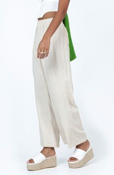 Look forward to the sunnier seasons even more in these breathable cotton and linen pants boasting a comfy drawstring waist. Elastic/drawstring waist Back patch pockets 55% cotton, 45% linen Machine wash, line dry Imported Neutral Cotton Bottoms For Vacation, Beach Cotton Bottoms In Flax Color, Cream Linen Tapered Leg Bottoms, Vacation Linen Bottoms In Neutral Color, Neutral Linen Bottoms For Vacation, Beige Linen Bottoms With Elastic Waistband, Linen Summer Pants For Daywear, Cream Linen Pants For Spring, Summer Linen Pants For Daywear