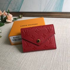 Big Red exclusive real shot! Gorgeous and functional, this supple and compact Victorine wallet in Monogram Empreinte leather is the ultimate fashion companion. Every detail has been carefully designed to play the storage function of a long wallet in a petite size. 

Size 12×9cm Compact Red Leather Wallet, Red Luxury Wallet For Everyday Use, Compact Red Wallet For Daily Use, Red Rectangular Wallet, Luxury Red Wallets With Interior Card Slots, Designer Red Wallet With Interior Card Slots, Designer Red Wallets With Interior Card Slots, Designer Red Wallet For Daily Use, Red Designer Wallets For Daily Use