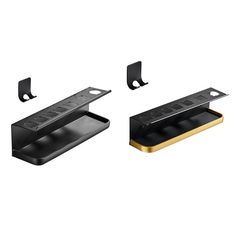 two black and gold shelf brackets on a white background