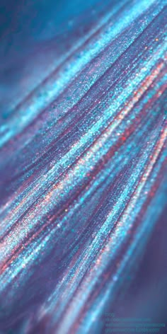 an abstract background with blue, pink and purple colors in the center is blurry lines