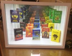 a display case filled with different types of teas