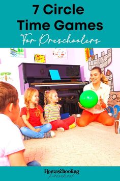 children sitting on the floor playing with balloons