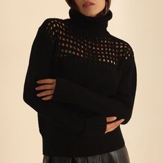 Elevate your winter wardrobe with our exquisite Turtleneck Knit Sweater featuring lace detailing on both the front and back. This women's sweater is the perfect blend of cozy comfort and sophisticated style. Key Features: Luxuriously soft and warm knit fabric for chilly days. Delicate ajour lacework adds a touch of elegance. High-quality turtleneck design keeps you cozy and stylish. Versatile and fashionable; ideal for casual outings or dressier occasions. Available in a range of lovely colors t Winter Knit Sweater With Hollow Out Design, Winter Knit Sweater With Hollow-out Details, Winter Hollow-out Knit Sweater, Chic Long Sleeve Fishnet Top, Black Fishnet Top For Fall, Fishnet Long Sleeve Tops For Fall, Open Knit Tops For Winter Layering, Black Open Knit Top For Winter, Black Knit Sweater