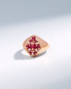 Suzanne Kalan La Fantaisie Star Ruby Signet Ring in 18k rose gold Luxury 14k Gold Ruby Ring With Rose Cut Diamonds, Luxury Marquise Ruby Ring, Luxury Marquise Ruby Ring With Diamonds, Luxury Ruby Cluster Ring With Gemstones, Luxury Rose Gold Cluster Ring With Gemstone, Luxury Red Diamond Ring With Single Cut Diamonds, Rose Gold Ruby Ring In Fine Jewelry Style, Luxury Ruby Cluster Ring For Promise, Luxury Ruby Diamond Ring With Rose Cut Diamonds