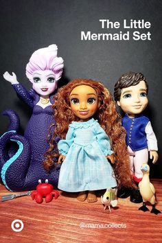 three dolls are posed next to each other in front of a blackboard with the title, the little mermaid set