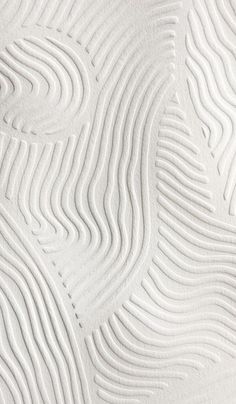 an abstract white wallpaper with wavy lines