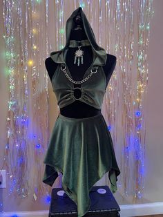 This item is a pre order. Please see shipping dates for estimates. Comes as a 4 piece set of detached chain hood, choker necklace with green aventurine beaded crystals, o-ring halter top and fairy skirt. stretch fabric, 90% polyester, 10% spandex. Stainless steel metal hardware. Hand wash and hang dry. Dry off metal hardware after washing. Beading is delicate so handle with care. Refer to size chart pictured to find your size. How to measure: Bust: To take bust measurements please measure around Snake Rave Outfit, Rave Outfits Green, Jellyfish Rave Outfit, Desert Rave Outfits, Dragon Outfit Aesthetic, Rave Fairy Outfits, Hippie Rave Outfits, Edc Outfits Ideas, Fairy Festival Outfit