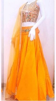 https://www.indiabazaaronline.com/mirror-work-navratri-lehenga-in-orange-art-silk-wj007504.html Traditional Drape Bollywood Lehenga For Ceremonies, Anarkali Floor-length Choli For Traditional Ceremonies, Bollywood Style Lehenga For Traditional Ceremonies, Festival Art Silk Anarkali Set, Orange Silk Salwar Kameez For Wedding, Anarkali Silk Thread Lehenga For Traditional Ceremonies, Gold Floor-length Lehenga For Traditional Ceremonies, Traditional Orange Dola Silk Lehenga, Traditional Orange Dola Silk Choli