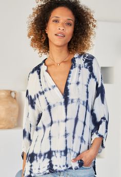 Eco friendly caftans and tunics inspired by the ocean, made on main street. Ethically sourced and locally made in Los Angeles. Inspired by our popular gauze dress, the perfect gauze shirt seemed like a no-brainer. Made in our classic, super soft, easy-care cotton gauze, this flattering shirt looks great on everybody, every time. With a perfect v-neck, gentle gathers and the ideal sleeve length, this one will be in heavy rotation. We added side slits to the hem to ensure a comfortable fit over the hips. Pairs perfectly with our gauze palazzo pant and just about everything else in your wardrobe. Sheerness: none Model height: 5'10" Fabric: 100% Cotton Machine wash, tumble, hang or lay flat to dry. // Flowy Bohemian Blouse For Loungewear, Bohemian Tunic For Daywear With Relaxed Fit, Bohemian Tunic With Relaxed Fit For Daywear, Relaxed Split Neck Blouse For Vacation, Relaxed Fit Split Neck Vacation Blouse, Relaxed Fit Split Neck Blouse For Vacation, Beach Cotton Gauze Tops With Relaxed Fit, Bohemian Cotton Gauze Top For Beach, Beach Relaxed Fit Cotton Gauze Tops