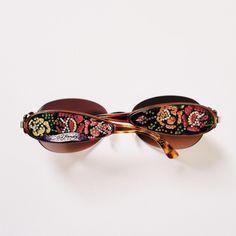 Vintage Ed Hardy sunglasses / Christian Audigier sunglasses. small round brown tinted rimless lenses. toitoise shell print arms with diamanté crystal studded detailing  Comes with original Ed Hardy leather case and cloth  Great condition 90s sunglasses  Y2k sunglasses   FULLY TRACKABLE SHIPPING SERVICE. UK AND WORLDWIDE SHIPPING. Vintage Designer Sunglasses, Cool Jewelry Unique, Sunglasses Y2k, Fashion Collection Inspiration, Vintage Ed Hardy, 90s Sunglasses, Shell Print, Rimless Glasses, Y2k Sunglasses